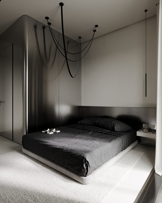 Стильна спальня з великим сірим ліжком, панорамними вікнами та сучасним освітленням.