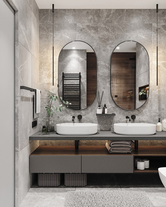 Сірі меблі з деревом Інтер'єр ванної кімнати з елегантною сірою тумбою, дзеркалом та дерев'яними акцентами.