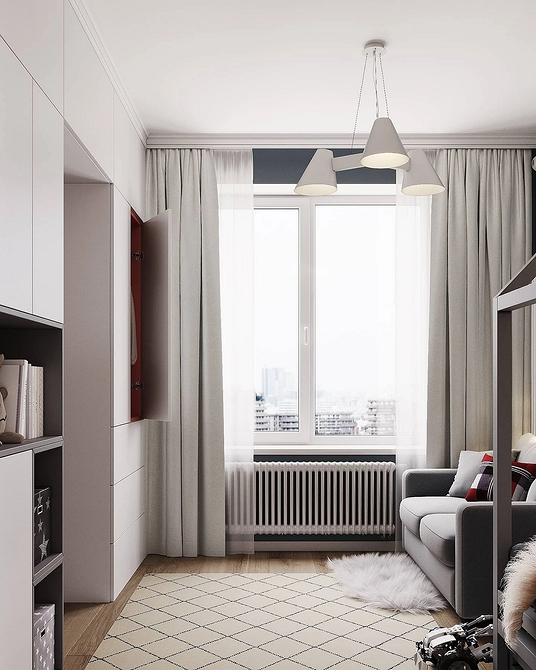 Зручний сірий диван у дитячій кімнаті для ігор та відпочинку, м'які меблі