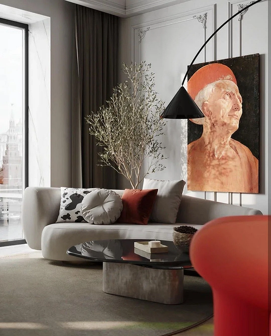 Сірий диван у стилі лофт з цегляною стіною та металевими акцентами в інтер'єрі.