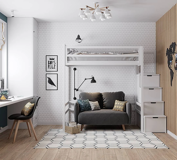 Зручний сірий диван у зоні відпочинку для релаксу з книгою.