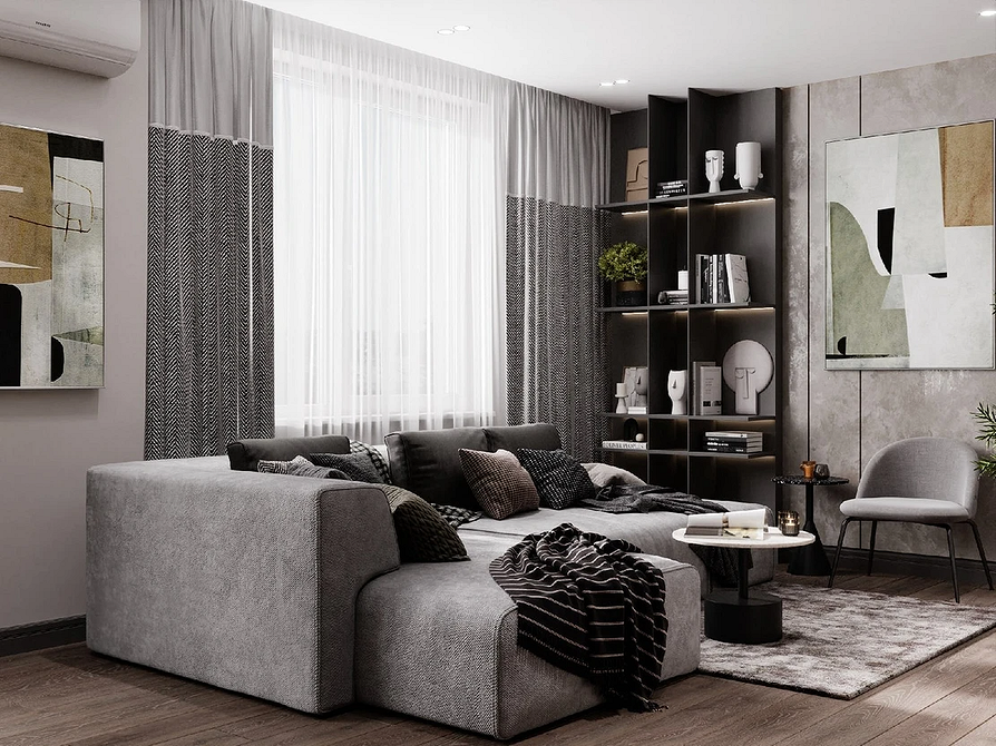 Вітальня з сірим диваном, журнальним столиком та великим вікном