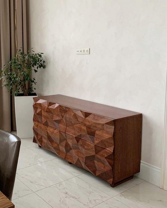 Мінімалізм в інтер'єрі Сучасний інтер'єр вітальні з елегантною тумбою під телевізор. Стильний мінімалізм.