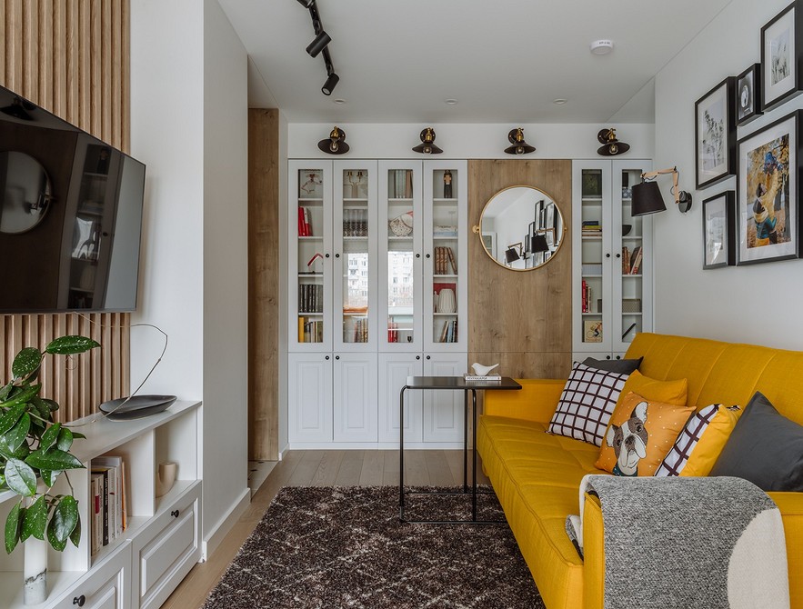 Світла вітальня з низькою ТВ-тумбою для зберігання речей. Дизайн 2026.