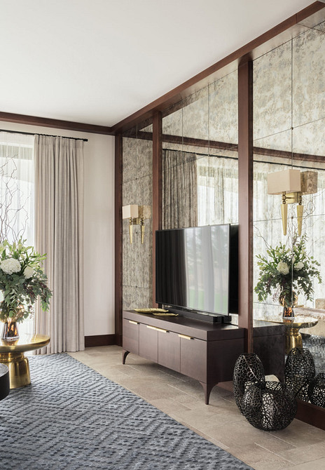 Тумба під телевізор з акцентним освітленням для сучасної вітальні.