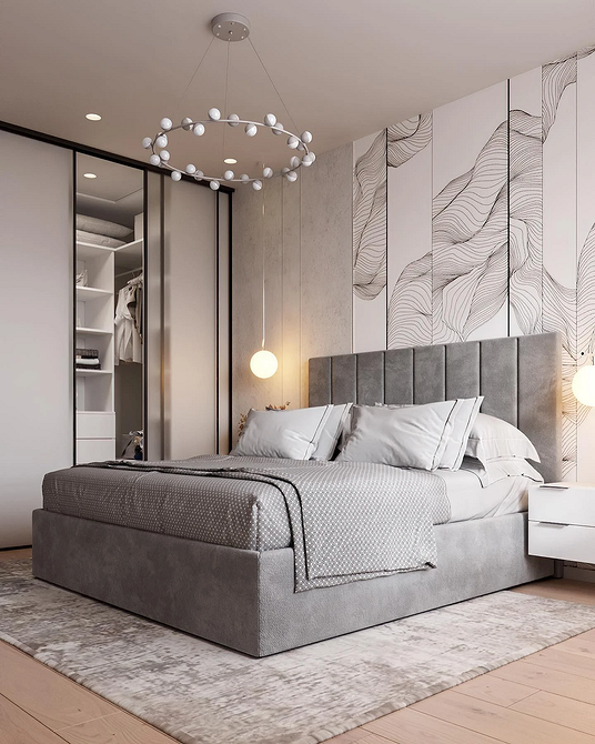 Елегантна шафа-купе з матовими скляними дверцятами в сучасній спальні.