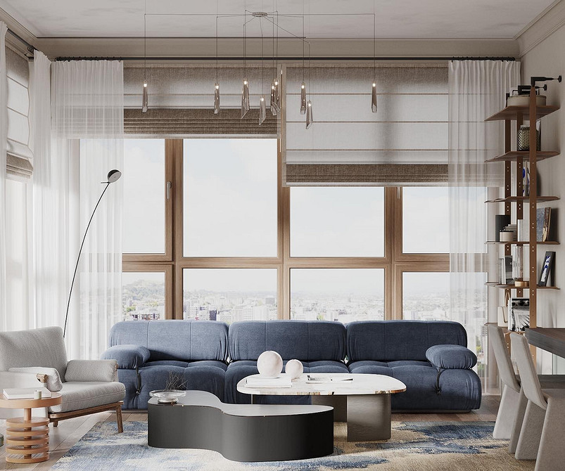 Розкішний синій велюровий диван в інтер'єрі з акцентними подушками