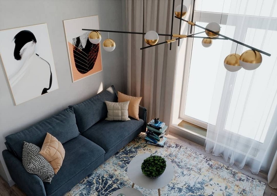 Синій диван в мінімалістичному інтер'єрі: поєднання з білими стінами та дерев'яною підлогою.