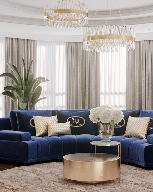 Синій диван: акцент вітальні Інтер'єр світлої вітальні 2026: синій диван як акцент у поєднанні з кольорами.