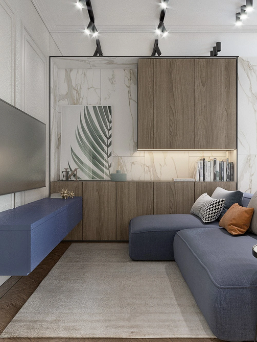 Елегантний синій диван в мінімалістичному інтер'єрі, сучасний дизайн