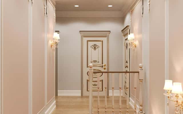 Елементи декору в стилі необароко: дзеркала, позолота та розкішні тканини.