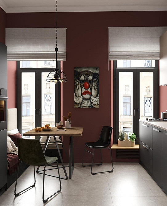 Кутовий диван біля вікна забезпечує максимальне природне освітлення на кухні.