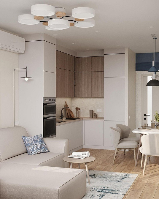 Сучасний сірий кутовий диван на кухні: нейтральний колір та стиль.