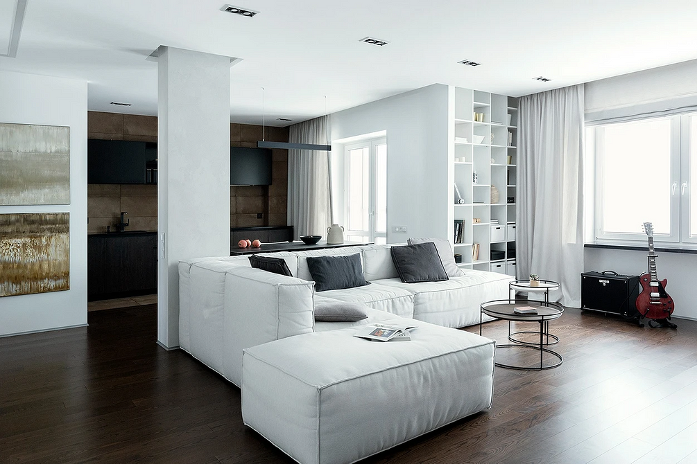 Модульний кутовий диван у сучасному інтер'єрі, можливість трансформувати простір за потреби.