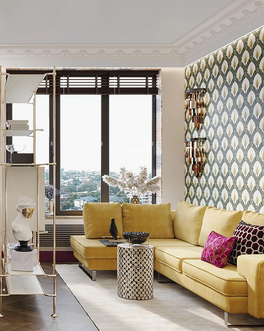 Кутовий диван з вбудованими полицями у вітальні з книгами та декором.