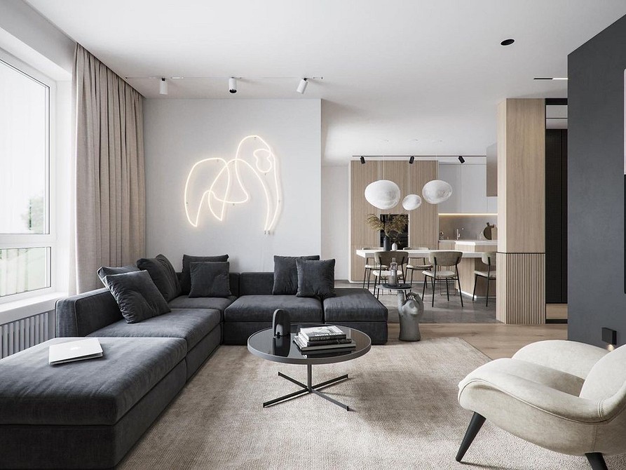 Сучасний кутовий диван з подушками різних кольорів у вітальні.