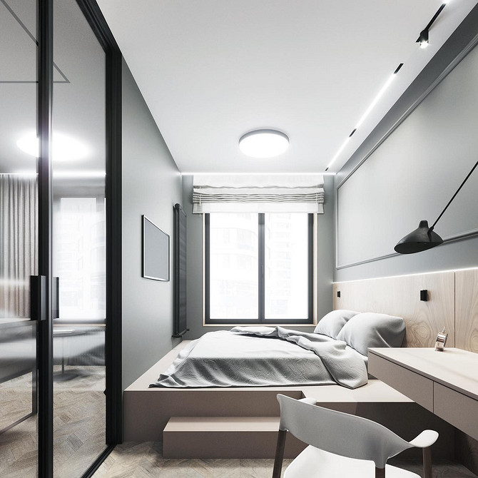 Зонування простору в спальні: ліжко та інші функціональні зони для комфорту.