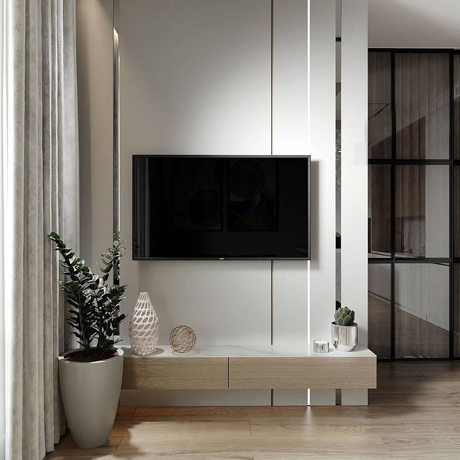 Підвісна тумба під телевізор з підсвічуванням створює ефект легкості та сучасності.