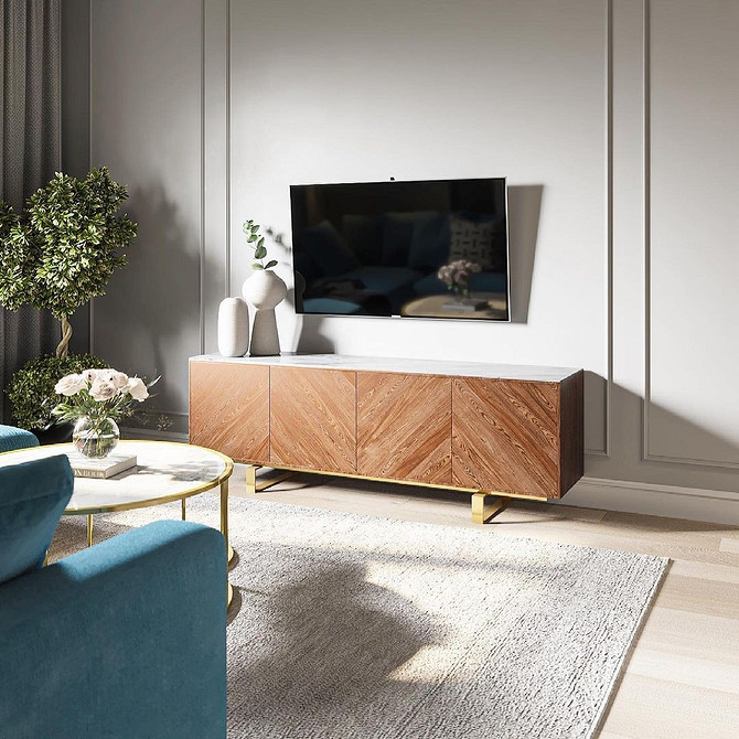 Біла тумба під телевізор з шухлядами – ідеальне рішення для зберігання речей.