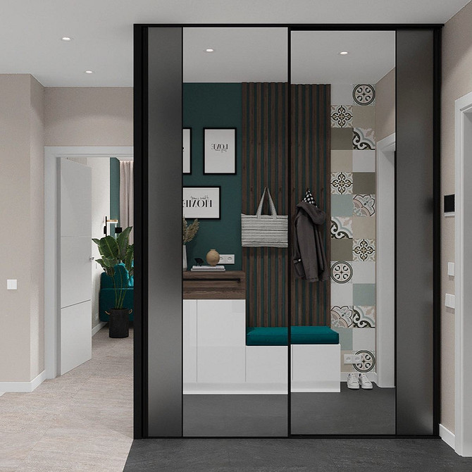 Дзеркальна шафа у передпокої з підсвіткою, функціональне та стильне рішення.