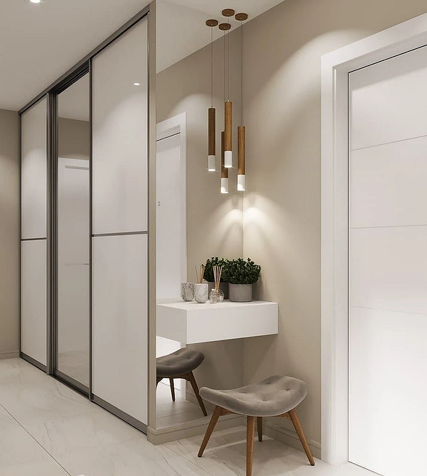 Велика дзеркальна шафа у вітальні: візуальне збільшення простору та елегантність 2026.