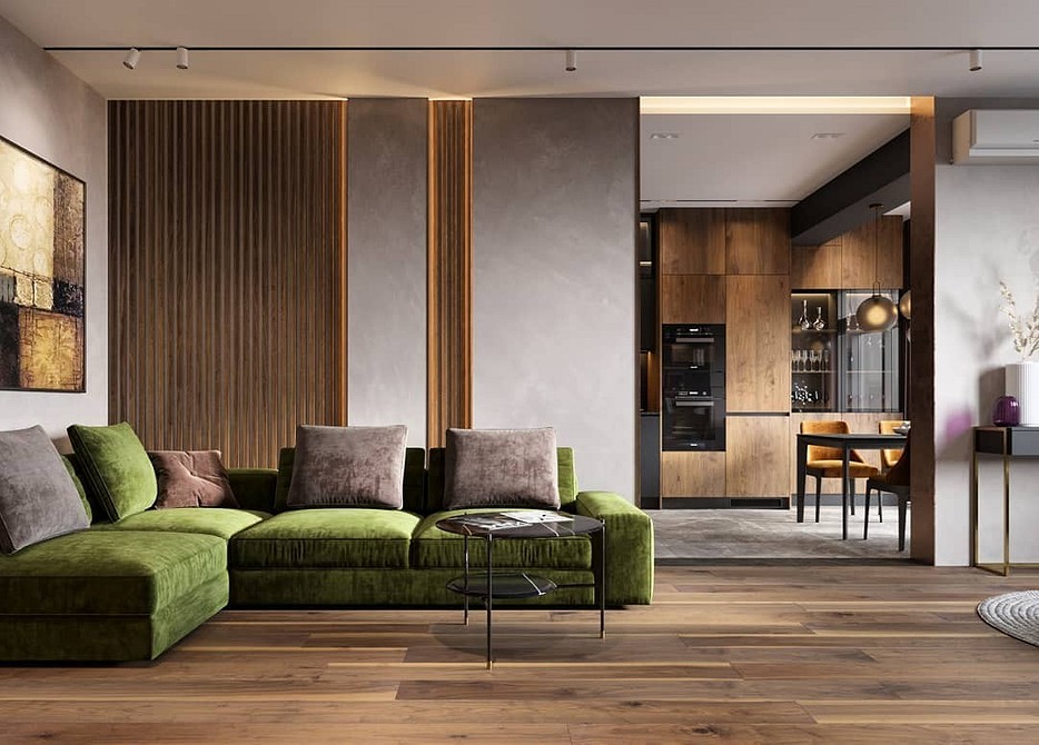 Зелений диван у вітальні з килимом та декоративними подушками, дизайн 2026