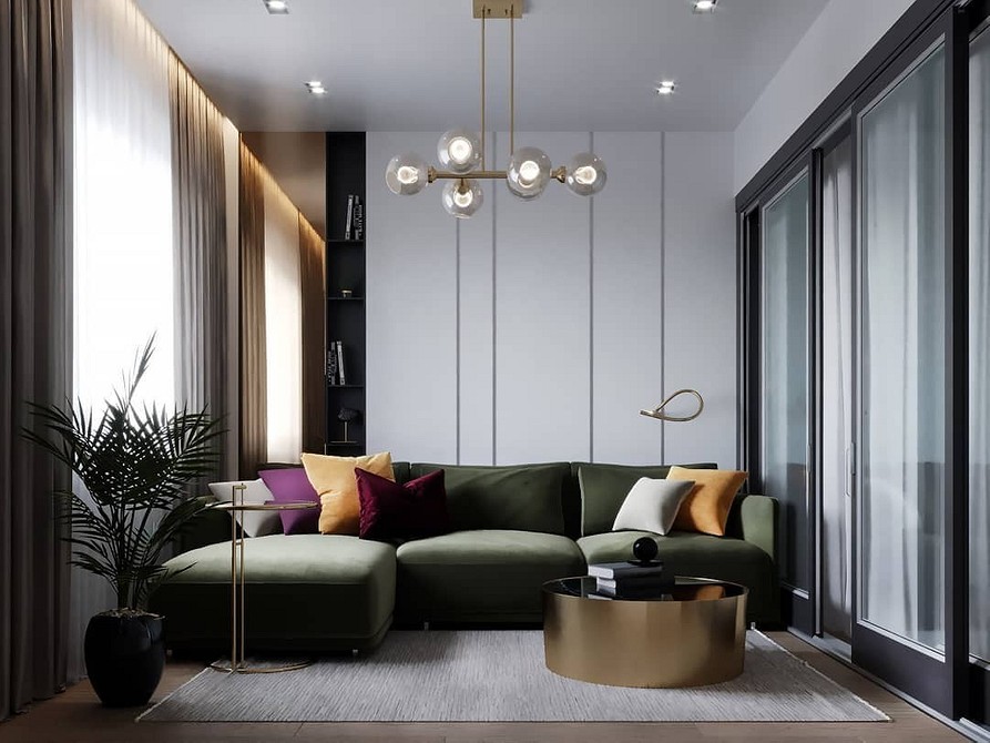 Кутовий зелений диван у вітальні: комфортне та функціональне рішення для великої родини