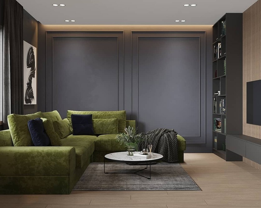 Дизайн вітальні з зеленим диваном та жовтими акцентами: яскраве та позитивне поєднання