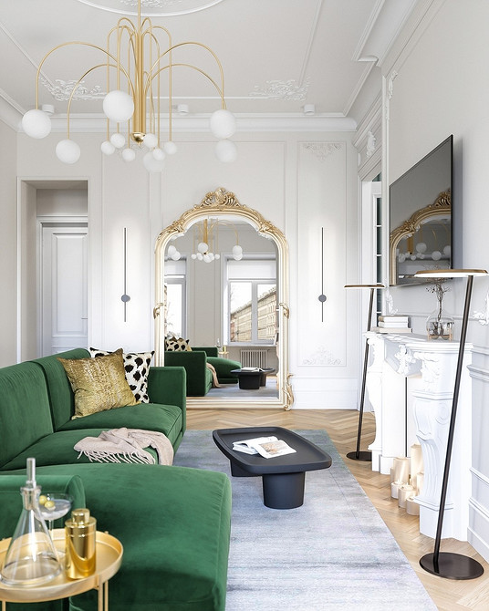 Світлий зелений диван у скандинавському інтер'єрі з мінімалістичним дизайном та світлими меблями.