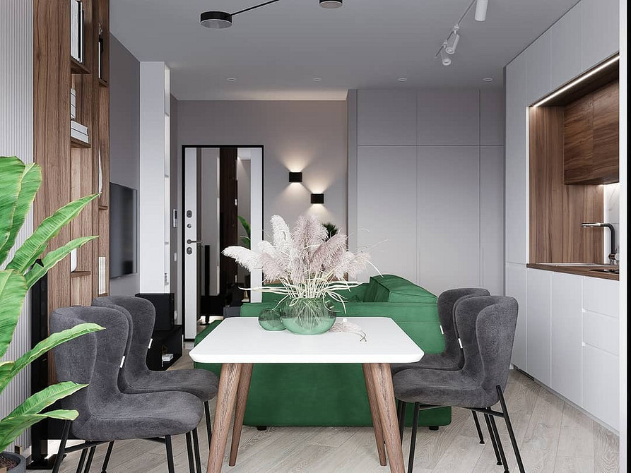 Зелений диван в інтер'єрі вітальні: ідеї поєднання кольорів та стилів у 2026 році.