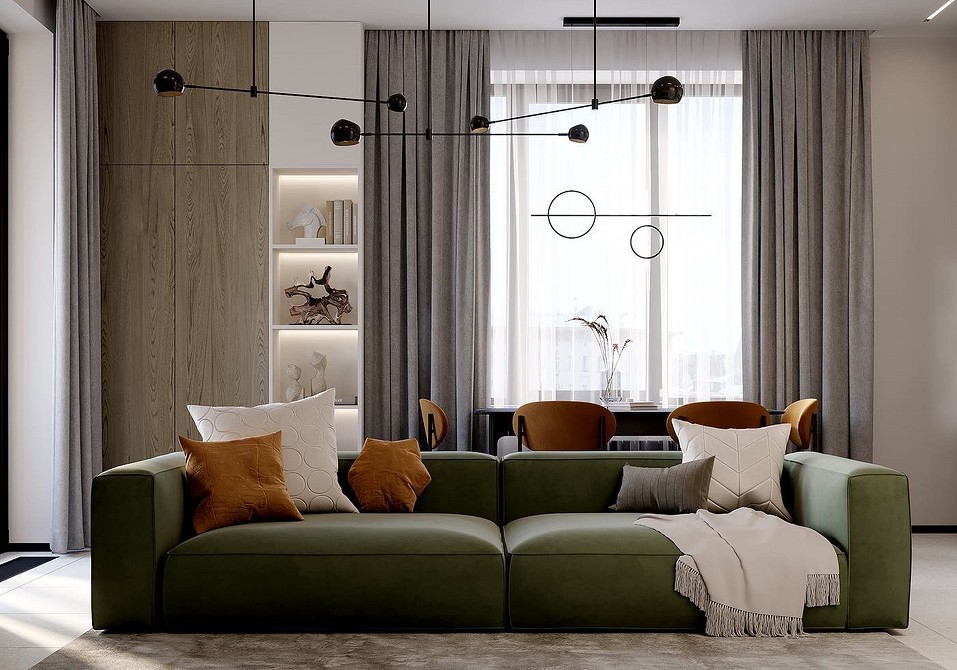 Інтер'єр з темно-зеленим диваном і килимом з геометричним візерунком, стиль 2026